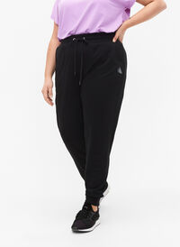 Losse trainingsbroek met zakken, Black, Model