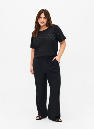 Zizzi Pantalon ample avec motif à trou, Black, Model image number 0